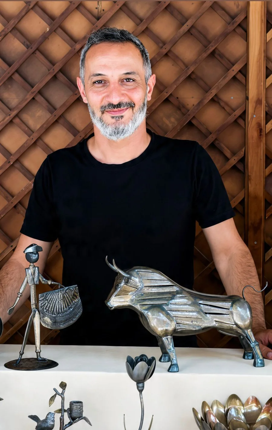 Sevak with his metal sculptures